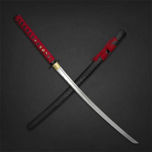 A 41-inch hand forged samurai sword with a red handle and a black scabbard, displayed crossed over each other.