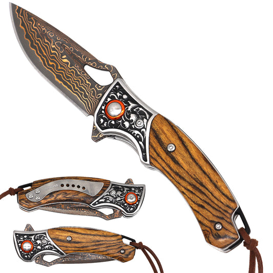 Folding knife with wooden handle and decorative blade on a white background
