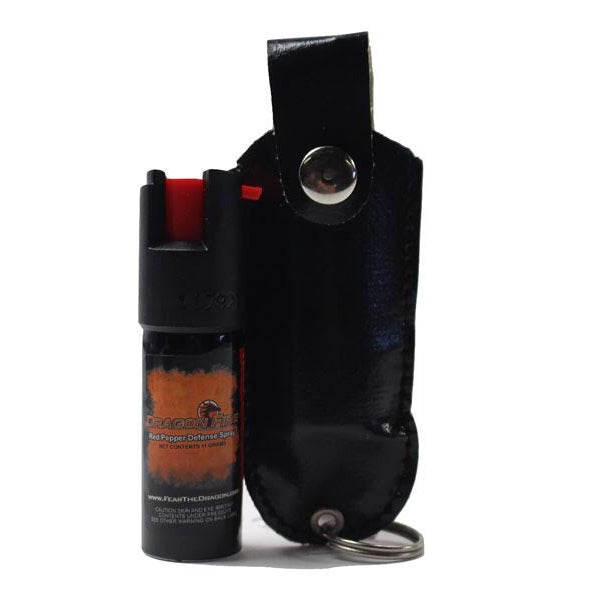 Pepper spray with black holster on a white background