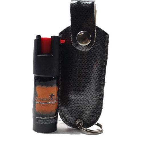 Pepper spray with a black sheath on a white background