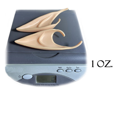 Pacific Solution Cosplay Latex Elf Ears displayed on a scale for weighing, showcasing realistic design and detail