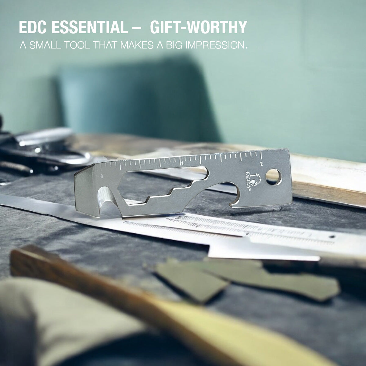 Falcon Silver Multi-Tool - 2.7" 8-in-1 Multi-Tool Keychain displayed on a workbench among tools