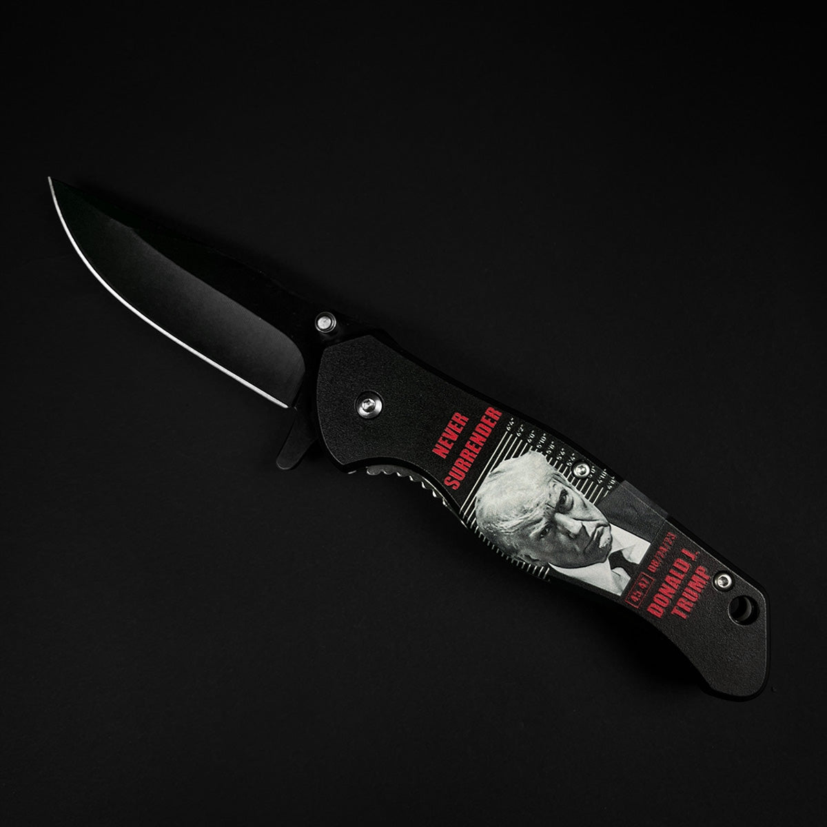President Trump Knife - Never Give Up Pocket Knife featuring a sleek black blade and unique handle design
