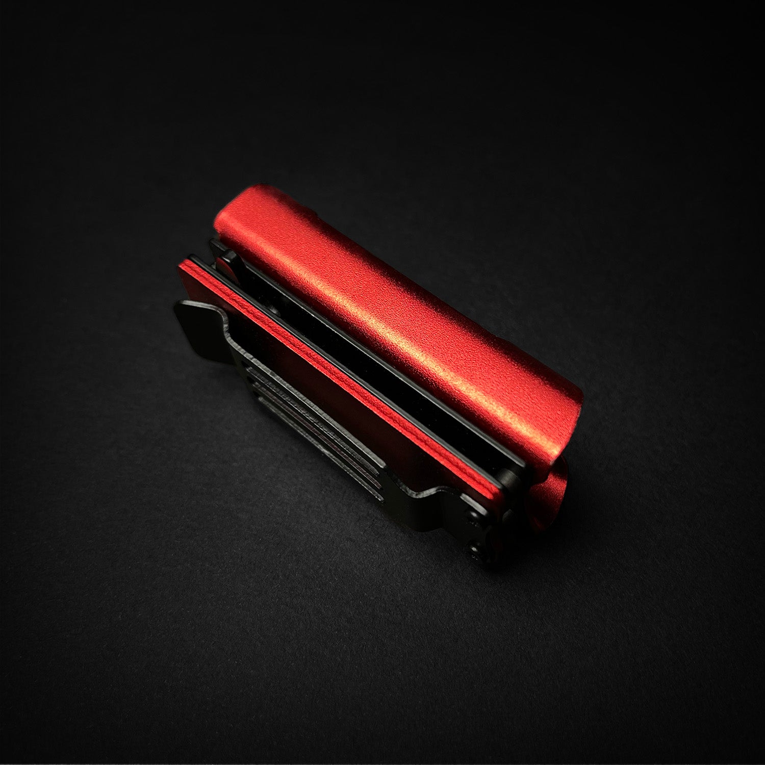 Red Spring Assisted Knife Lighter Case with a sleek design and integrated pocket clip for easy carrying