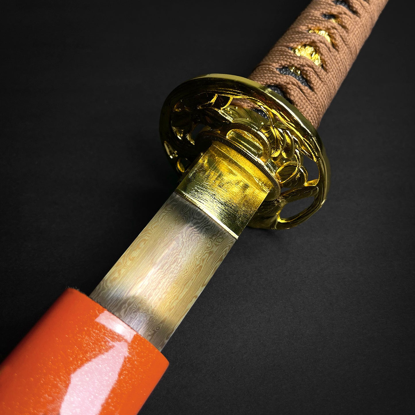 Musha Wholesale Damascus Katana for Sale with intricate details and vibrant orange handle