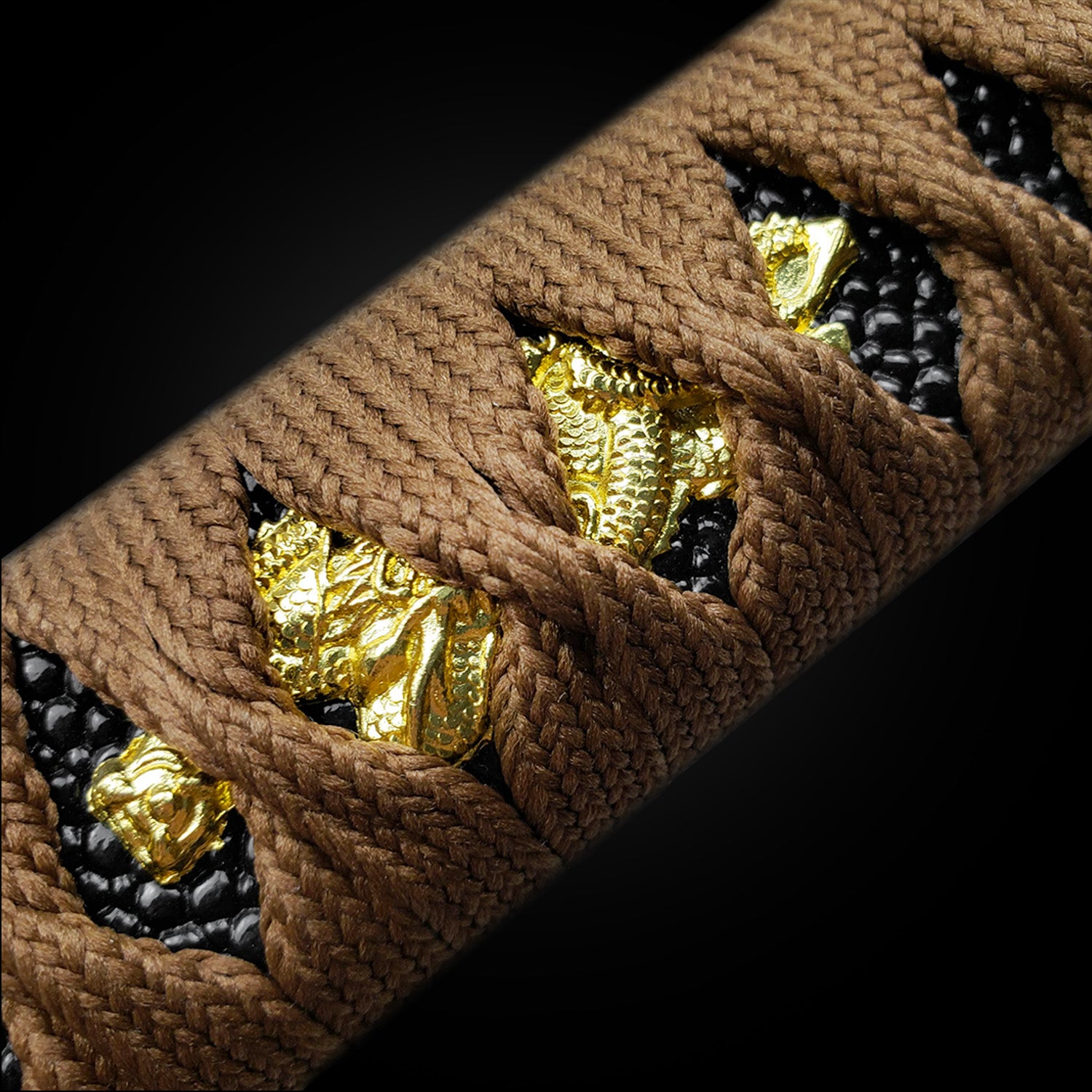 Close-up of Musha Wholesale Damascus Katana for Sale featuring intricate handle wrapping and decorative elements