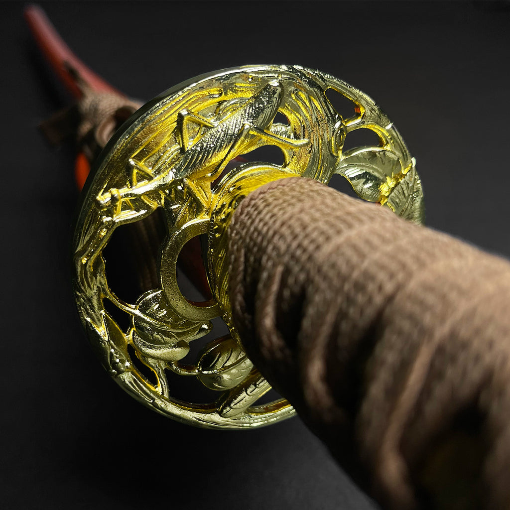 Close-up view of a Musha Wholesale Damascus Katana for Sale with intricate tsuba and wrapped handle