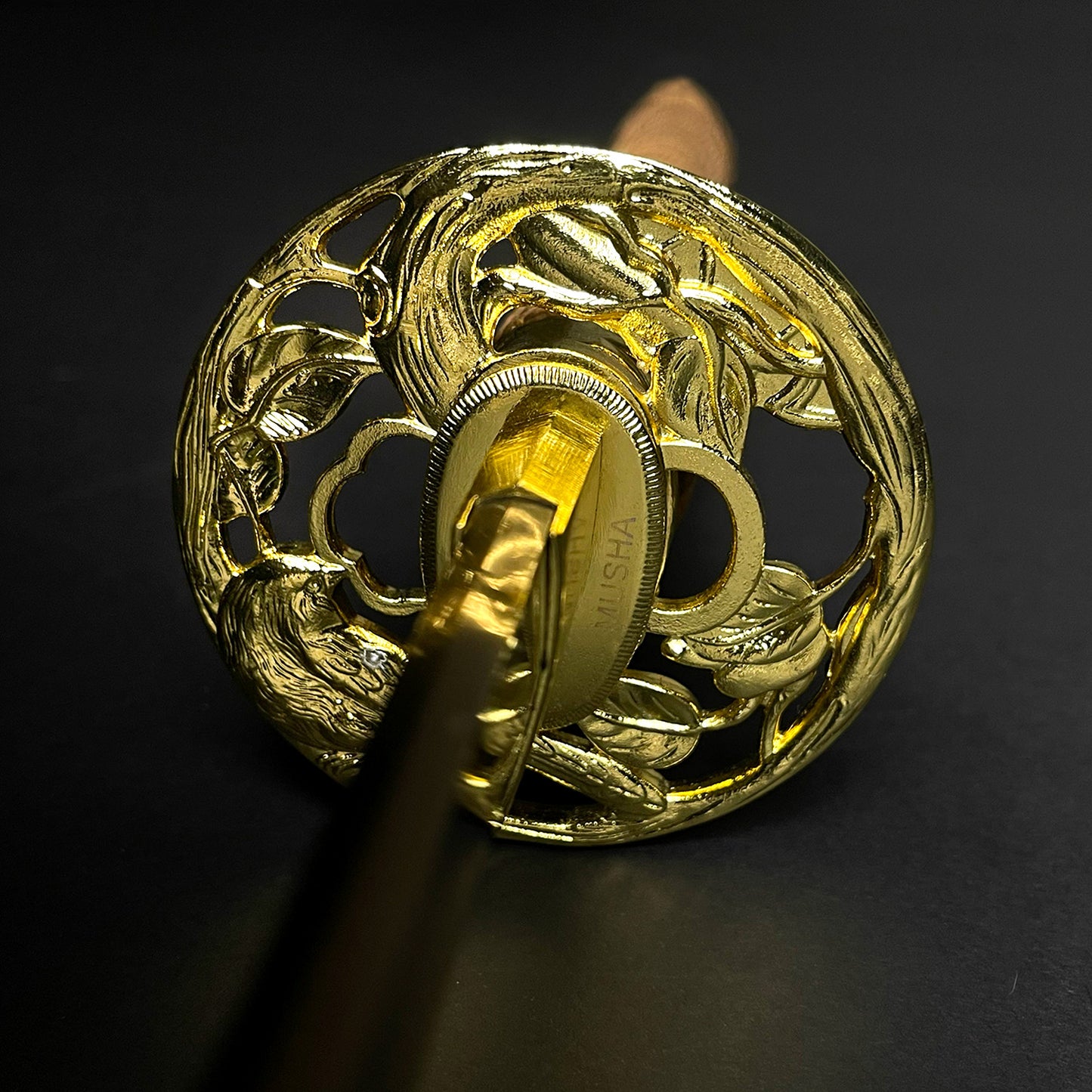 Close-up of Musha Wholesale Damascus Katana for Sale with intricate gold tsuba detailing