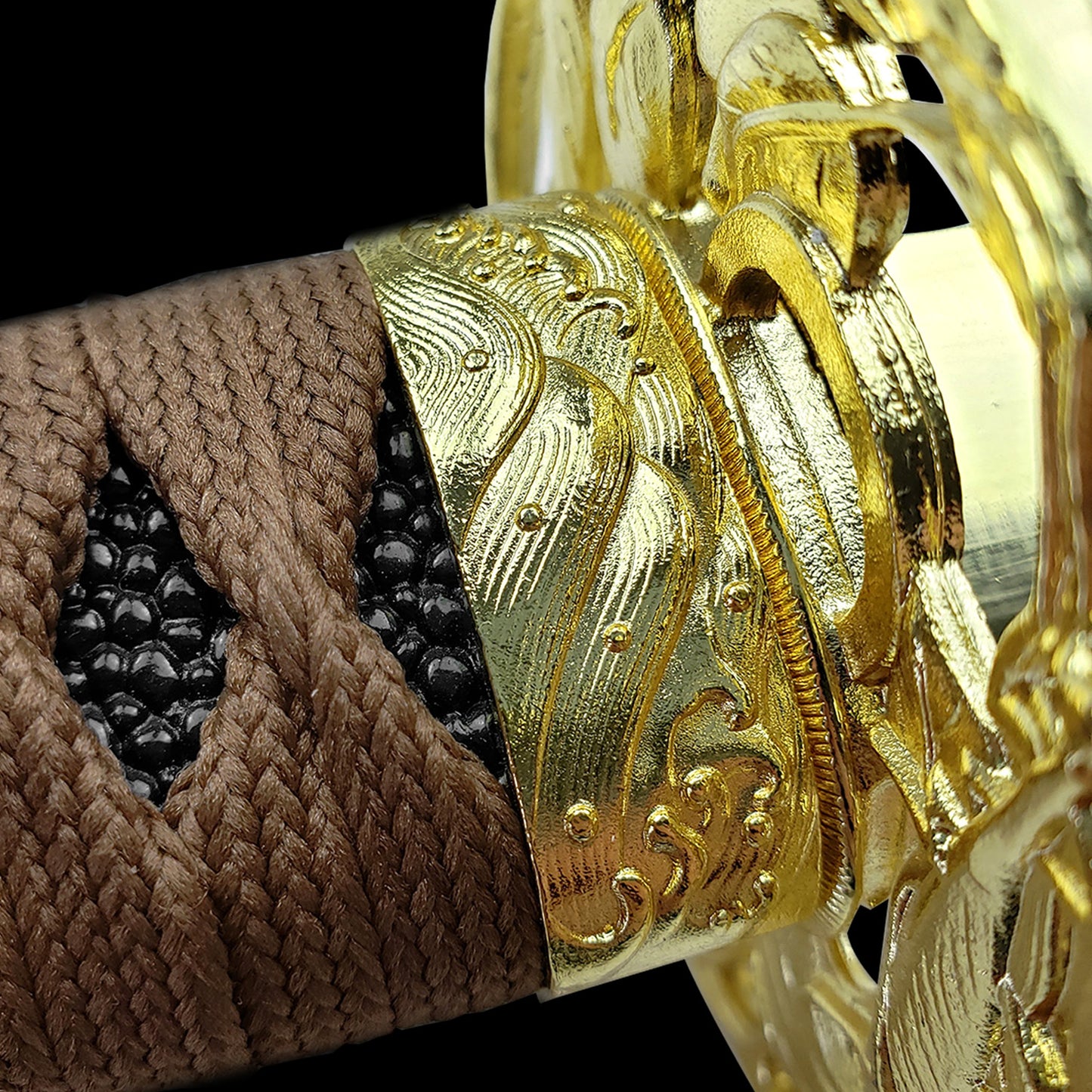 Intricate detail on Musha Wholesale Damascus Katana for Sale handle with decorative wrapping