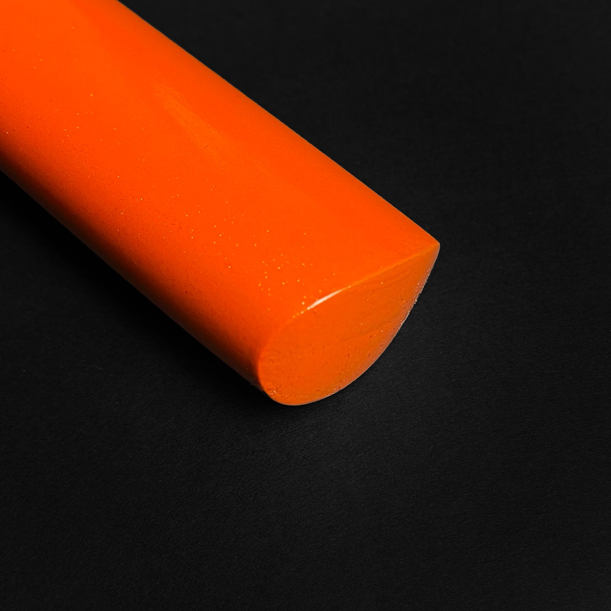 Close-up of the vibrant orange handle of a Wholesale Damascus Katana for Sale by Musha