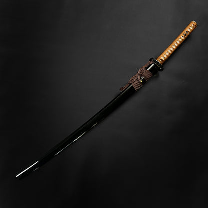 Wholesale Musashi Samurai Katana Sword with a sleek black blade and a traditional wrapped handle