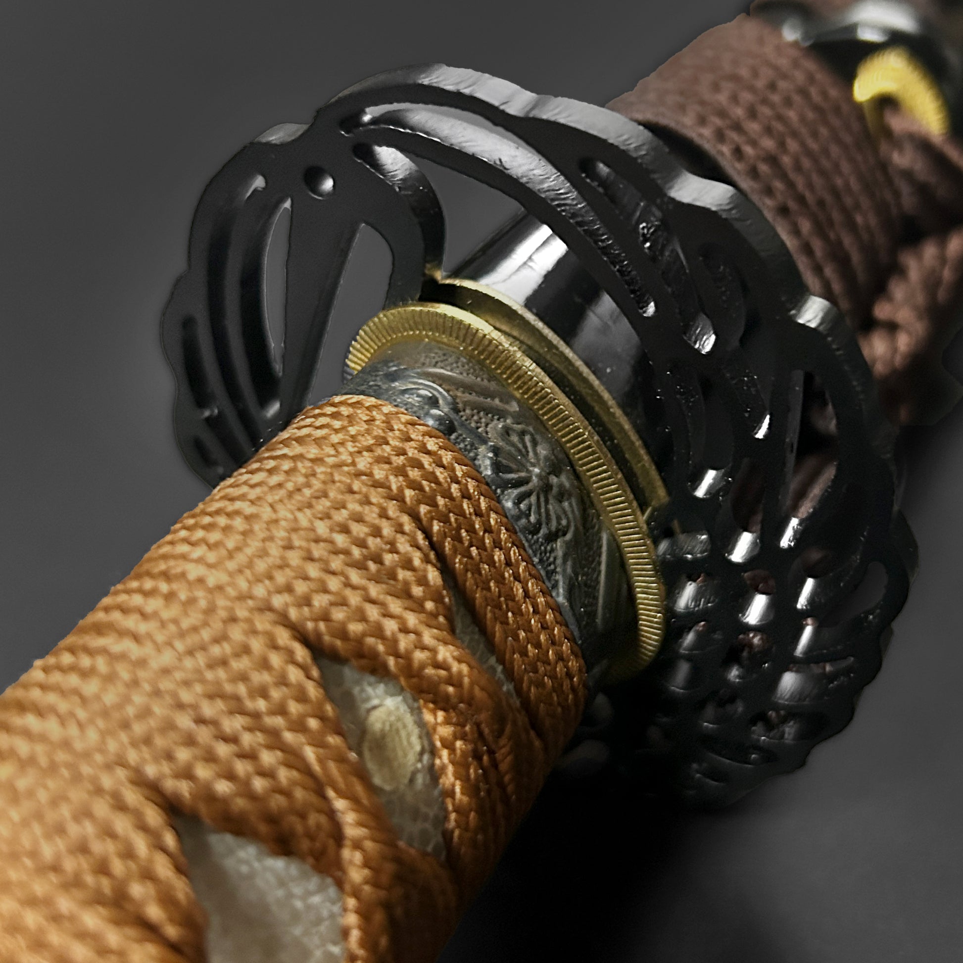 Detailed view of a Wholesale Musashi Samurai Katana Sword with intricate handle and guard design