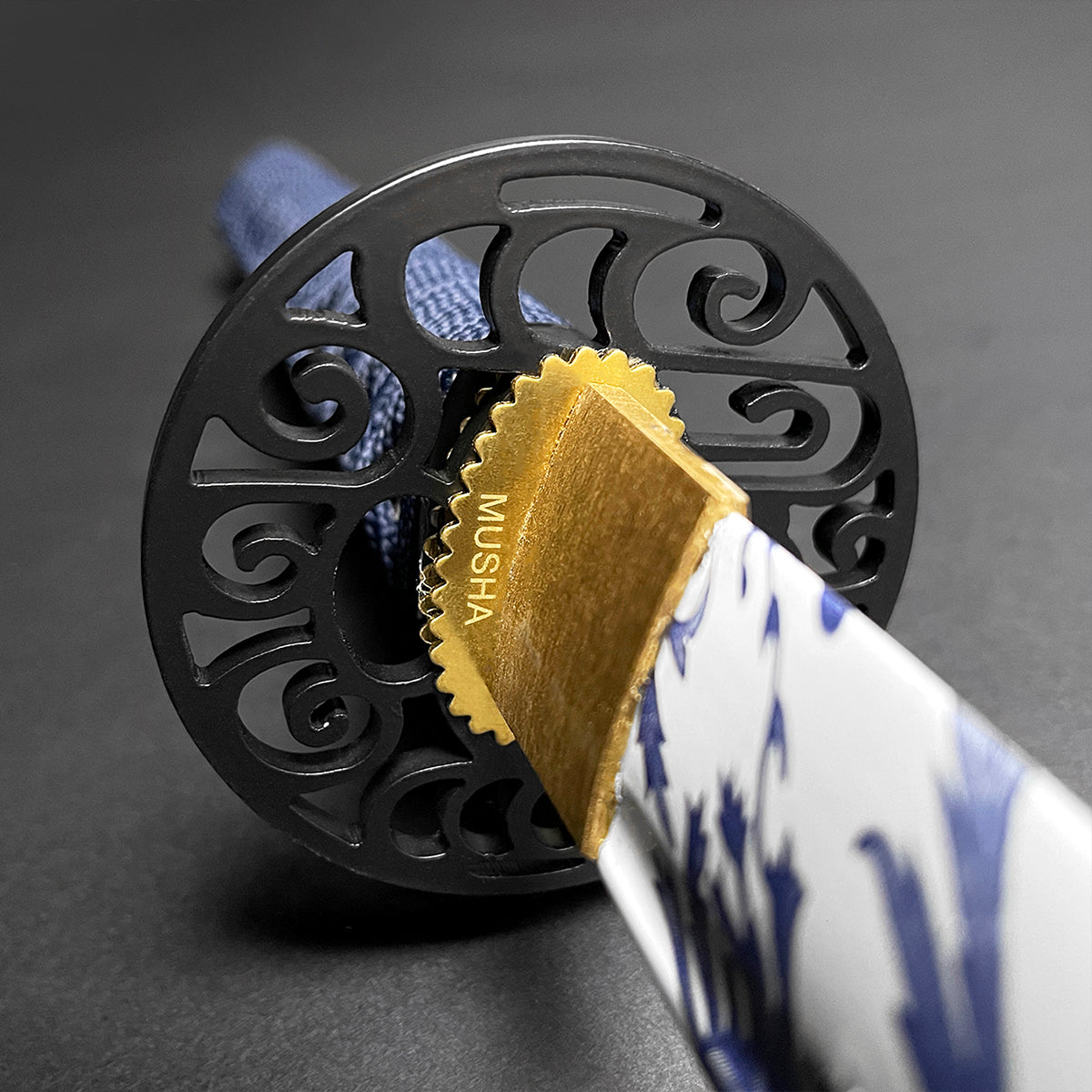 Close-up of Musha Samurai Sword Katana featuring intricate tsuba and decorative handle in wholesale design