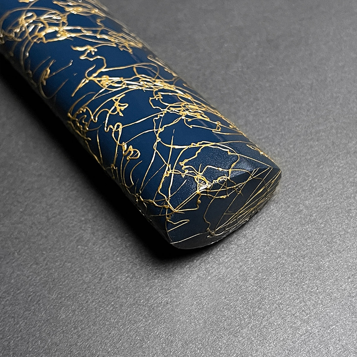 Close-up view of a blue handle with gold detailing on the Wholesale Musha Samurai Sword Katana