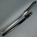 A hand-forged 'Kujaku' (Peacock) Katana with a detailed Kiku gata style tsuba, featuring a peacock tail with its feathers spread. The blade has a Damascus pattern and integrated Bo-Hi.