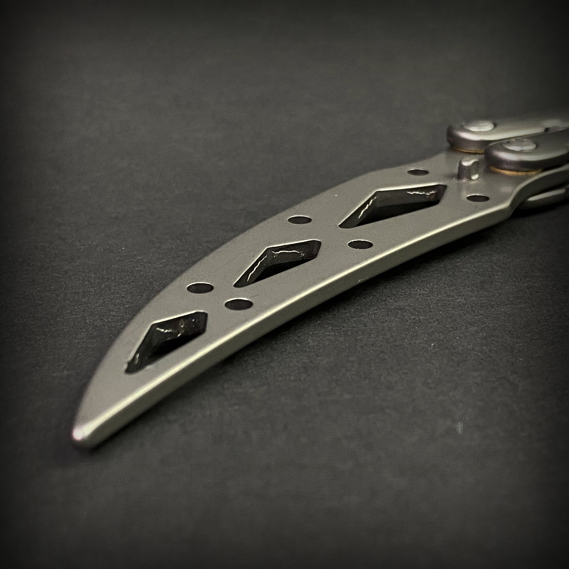 Chrome Butterfly Trainer - Balisong Practice Knife with a sleek design and durable blade for safe training