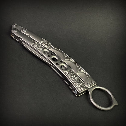 Chrome Butterfly Trainer - Balisong Practice Knife with decorative design and safety ring