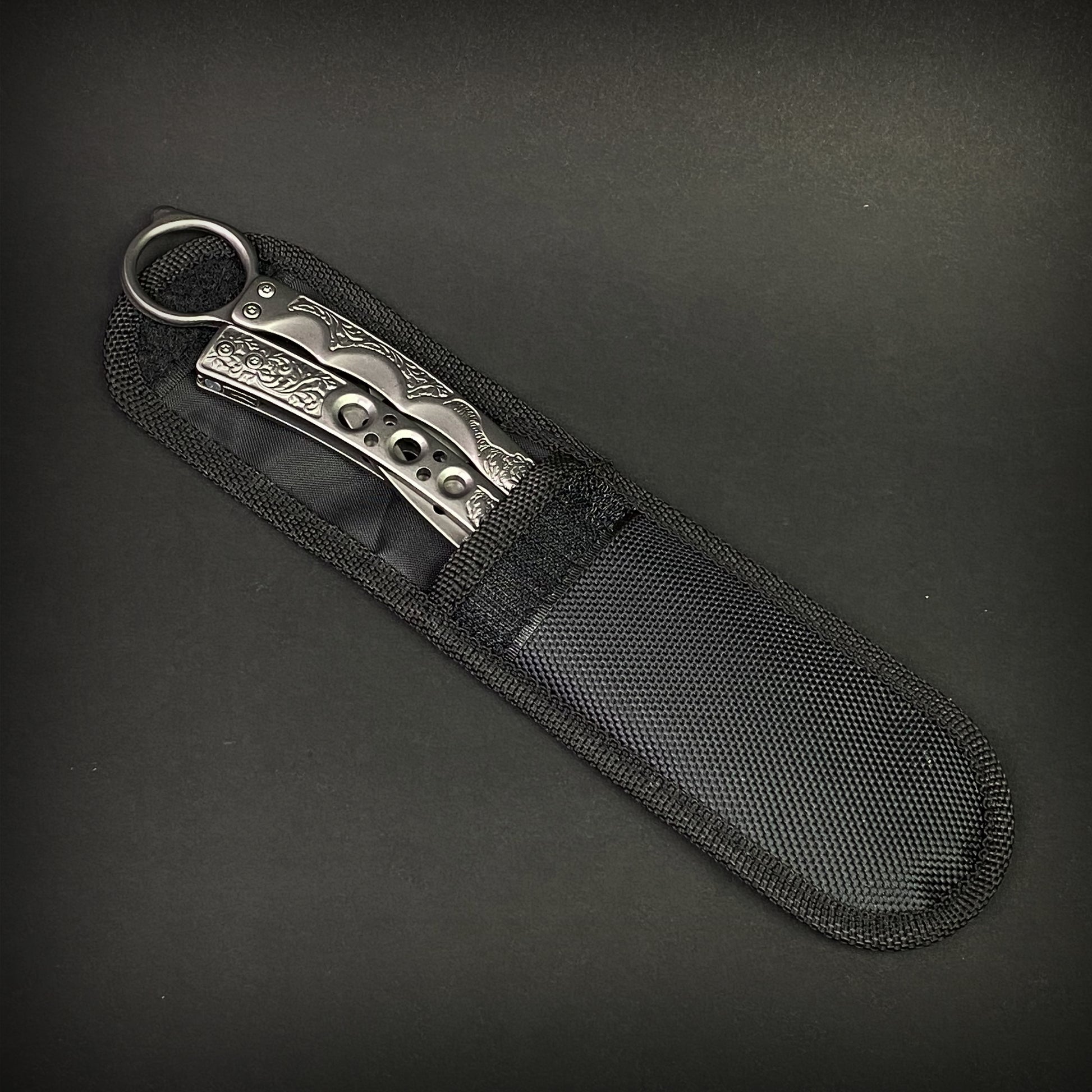Chrome Butterfly Trainer - Balisong Practice Knife in a durable black nylon sheath for safe storage