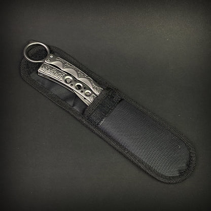 Chrome Butterfly Trainer - Balisong Practice Knife in a durable black nylon sheath for safe storage