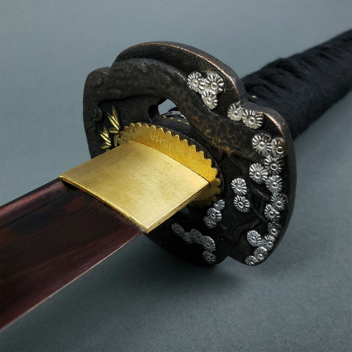 Musha Red Damascus Samurai Katana Sword with intricate tsuba and vibrant blade details