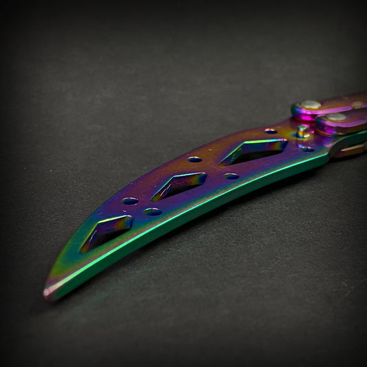 Rainbow Butterfly Trainer Balisong practice knife with a colorful metallic finish and unique design