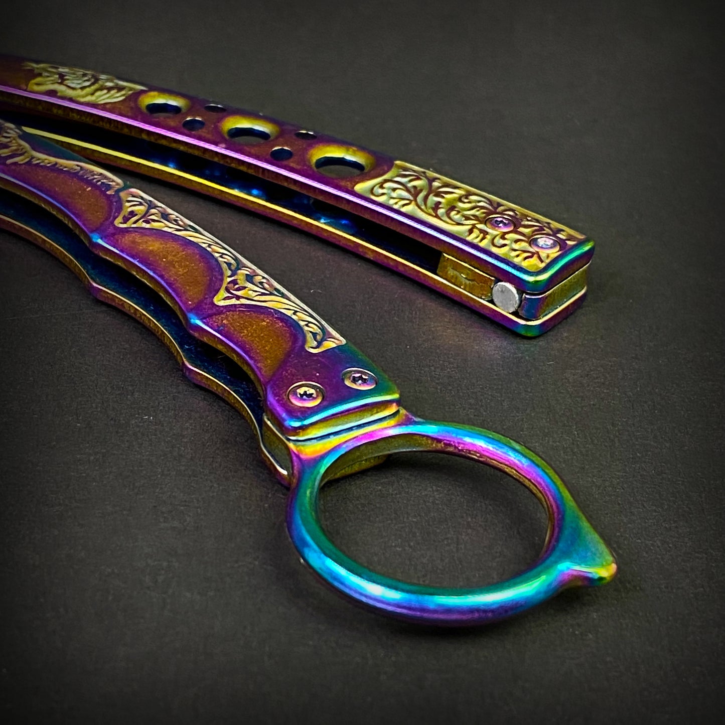 Rainbow Butterfly Trainer Balisong practice knife with intricate design and vibrant colors for safe training