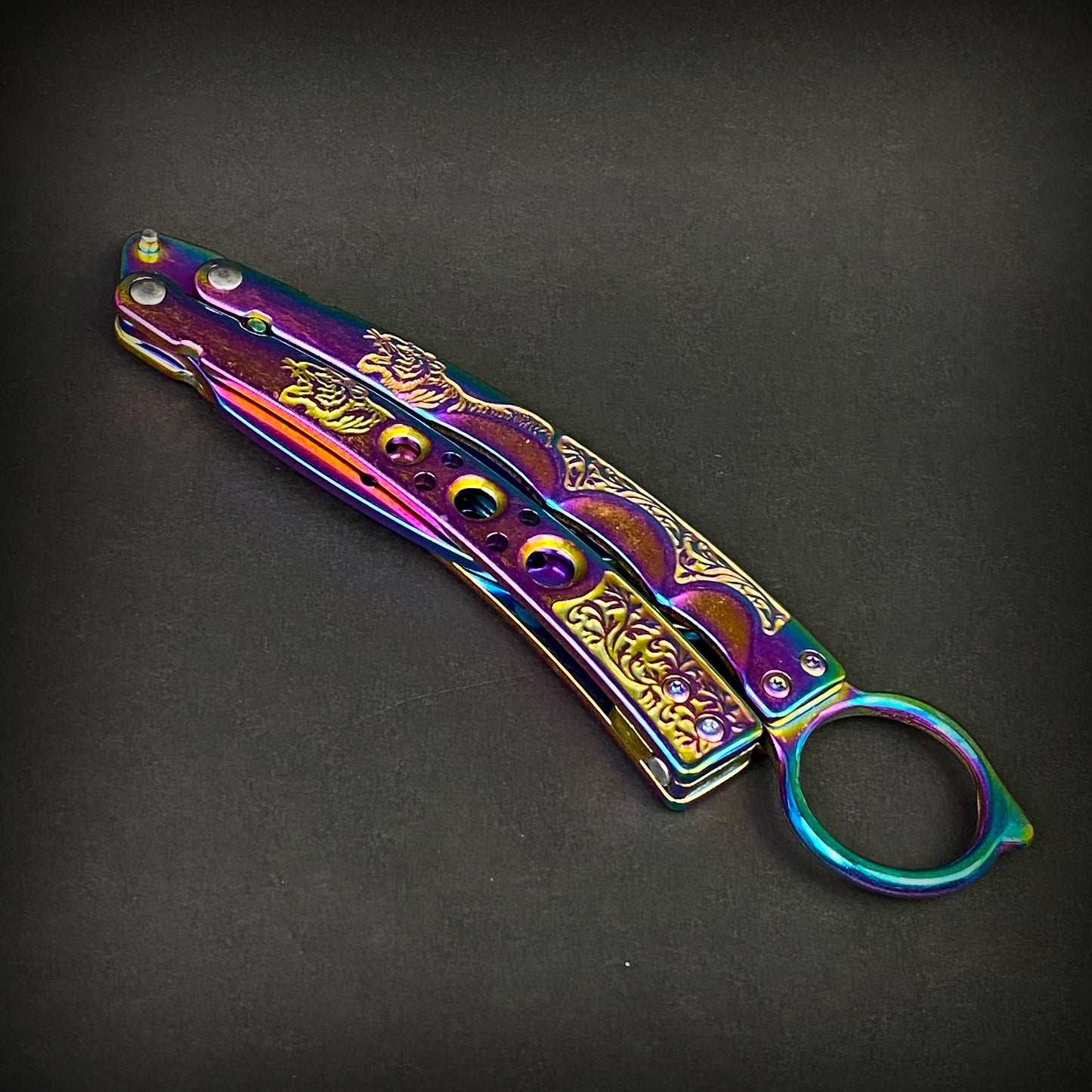 Rainbow Butterfly Trainer Balisong practice knife with intricate design and vibrant colors for skill development