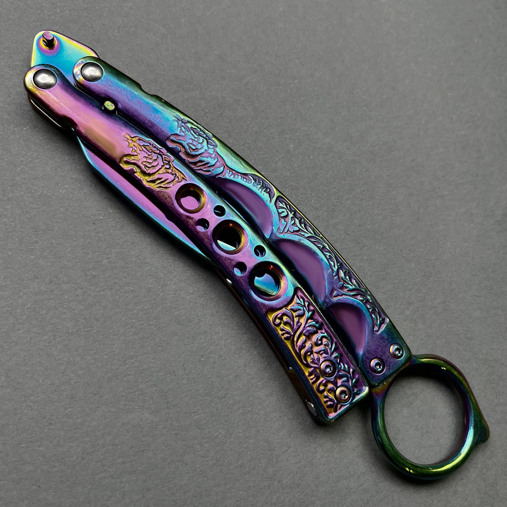Rainbow Butterfly Trainer Balisong practice knife with intricate designs and colorful finish